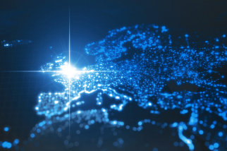 A digital map of Europe is shown with glowing blue points representing city lights. A bright light is centered around the region of France, highlighting it against the darker, surrounding areas. The overall effect is a stylized nighttime view.