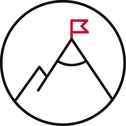 A simple line drawing of a mountain inside a circle, with a red flag at the top peak, symbolizing achievement or reaching a goal.
